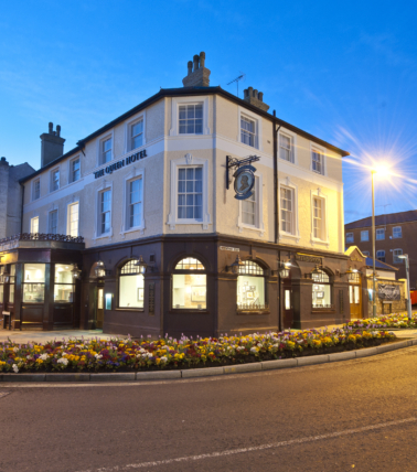 The Queen Hotel, Aldershot roadside at dusk