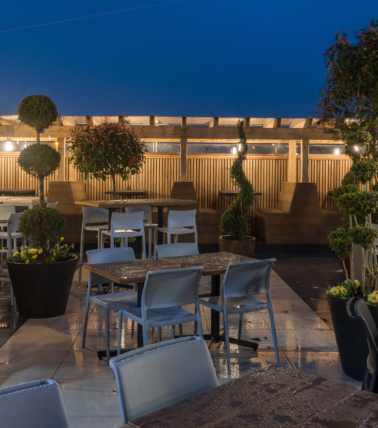 The John Russell Fox outdoor seating area at night